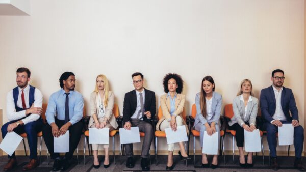 A group of people waiting for an interview